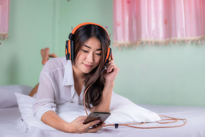 Young woman using mobile phone