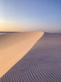 Scenic view of desert against clear sky