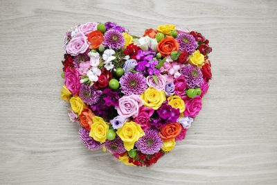 High angle view of multi colored flower bouquet on table