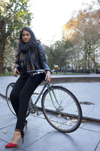 Portrait of a young woman in an urban park