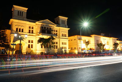 Light trails on city street at night