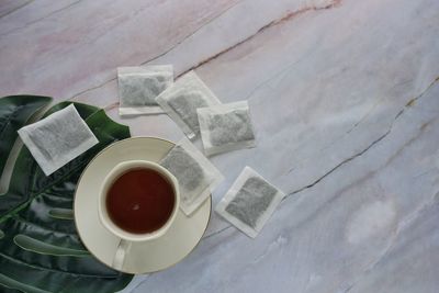 High angle view of coffee cup on table