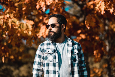 Young man looking away outdoors