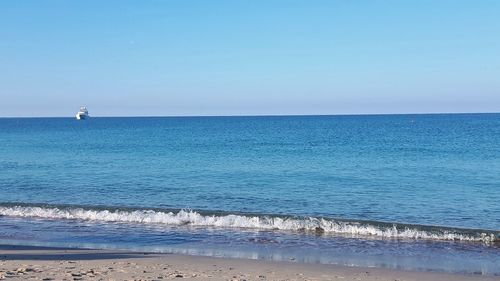 Scenic view of sea against clear sky