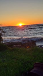 Scenic view of sea against sky during sunset