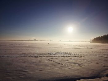 Scenic view of sea against clear sky during sunset