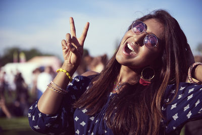 Portrait of young woman wearing sunglasses