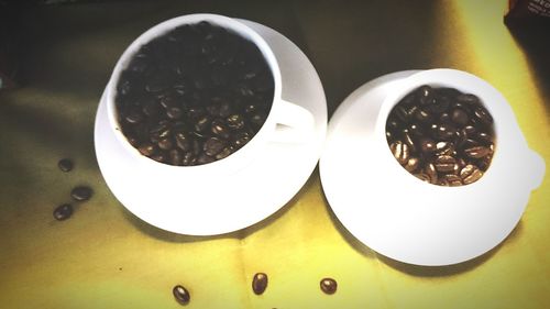 High angle view of coffee cup on table