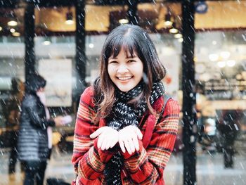 Portrait of smiling girl in snow