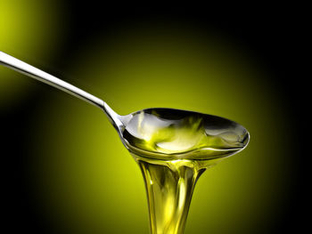Close-up of drink against white background
