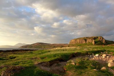 Scenic view of land against sky