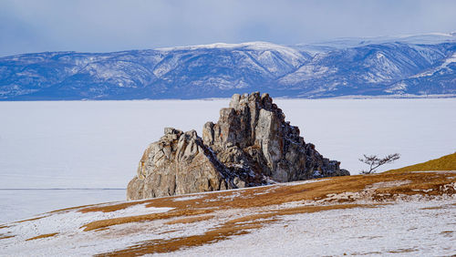 Shamanka rock in winter, lake baikal, russia