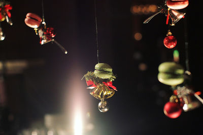 Christmas decoration hanging on strings at night