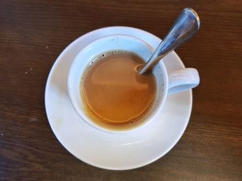 High angle view of coffee cup on table