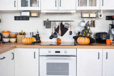 Close-up of pumpkins on shelves