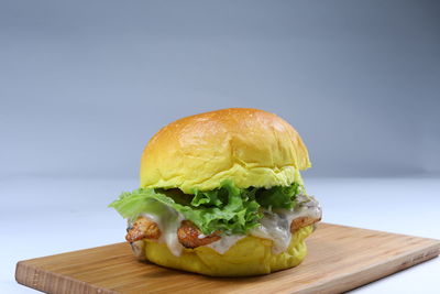 Close-up of burger on cutting board