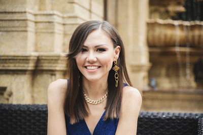 Portrait of young woman looking away