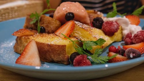 Close-up of fruits in plate on table