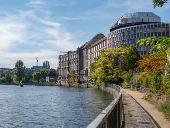 Bridge over river against sky