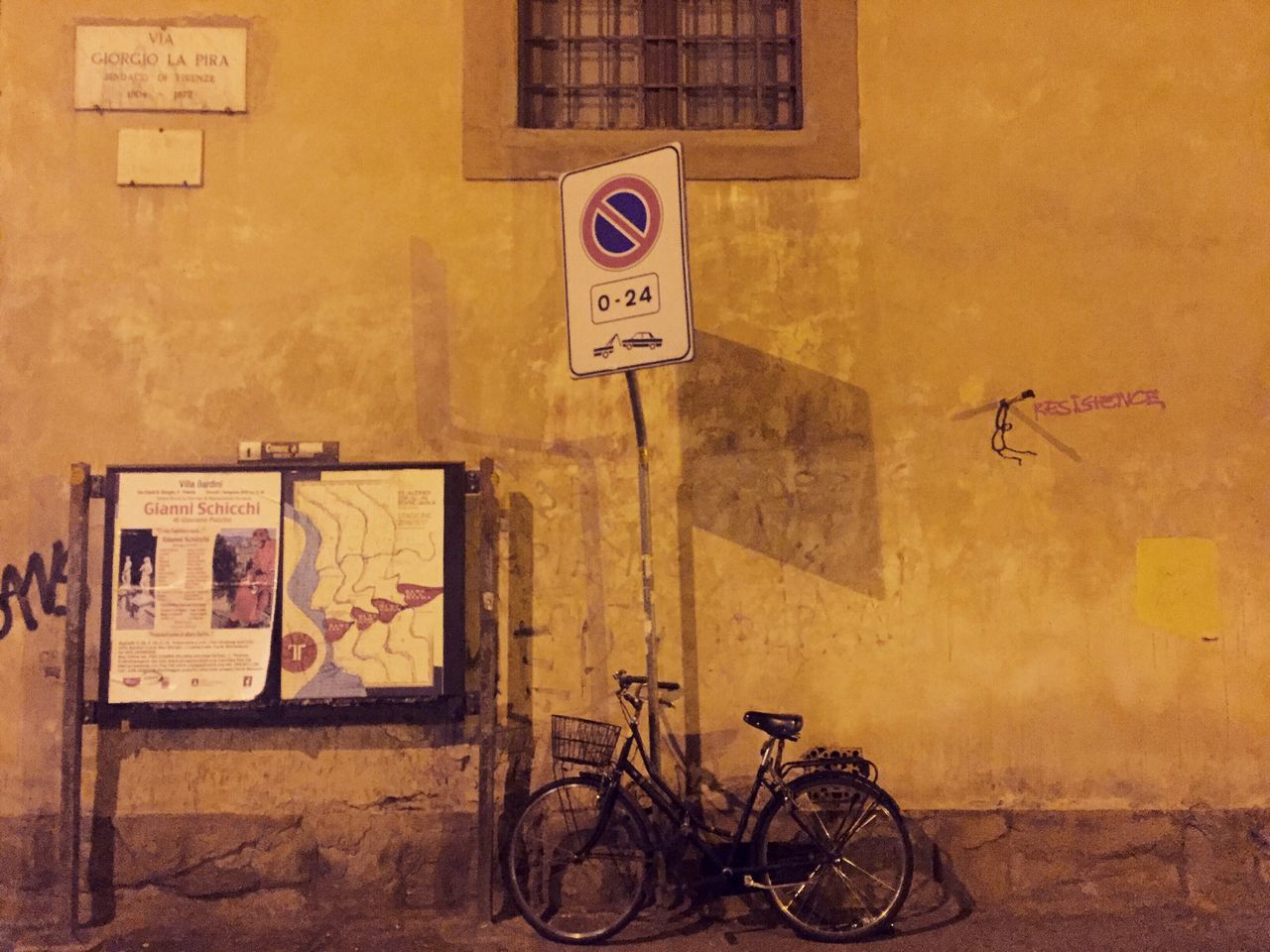 BICYCLES PARKED ON ROAD