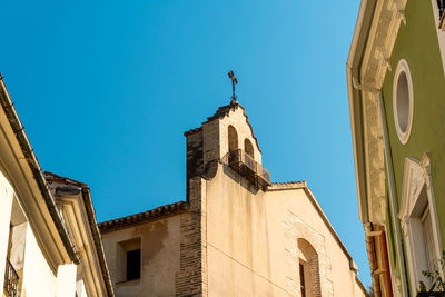 Simple bell tower in the convent of sant jacint in agullent ,valencia, spain.