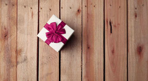 Directly above shot of christmas decorations on wooden box