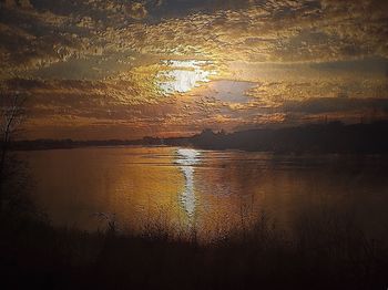 Scenic view of sea at sunset