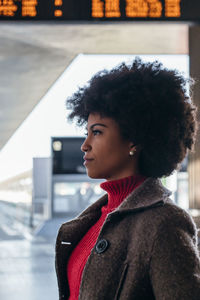 Portrait of a business woman at train station