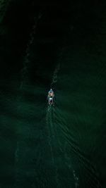 High angle view of person on sea against sky