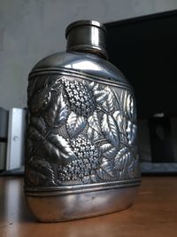 Close-up of glass jar on table