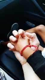 Woman holding hands