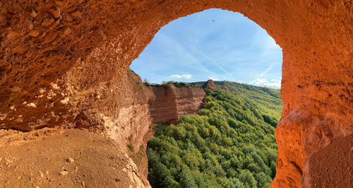 Scenic view of rock formation against sky