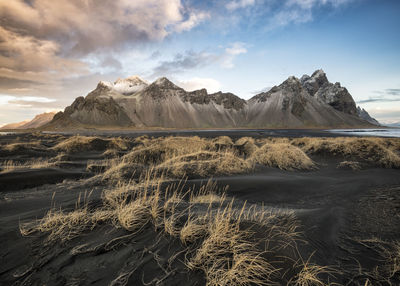 Scenic view of snowcapped mountains against sky