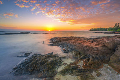 Scenic view of sea against sky during sunset