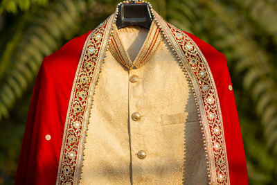 Close-up of cross hanging against blurred background