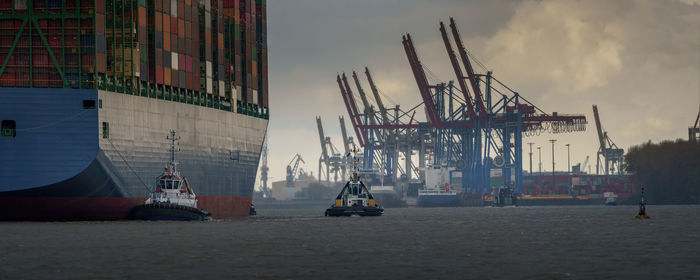 Large container ship arrives in the port of hamburg