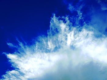 Low angle view of clouds in blue sky