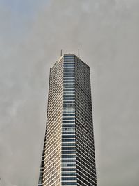 Low angle view of skyscraper against sky