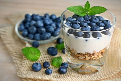 Close-up of blueberries in yogurt on table