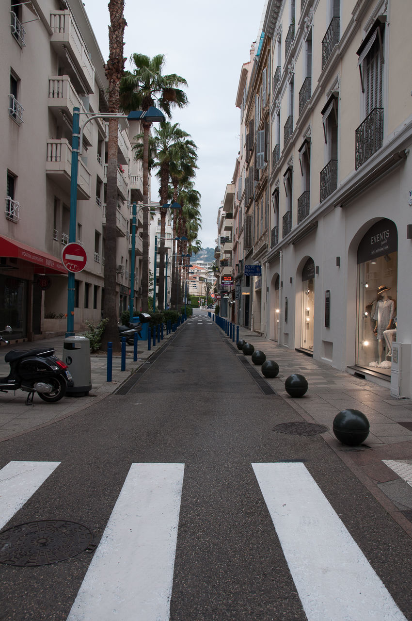 VIEW OF STREET AMIDST BUILDINGS