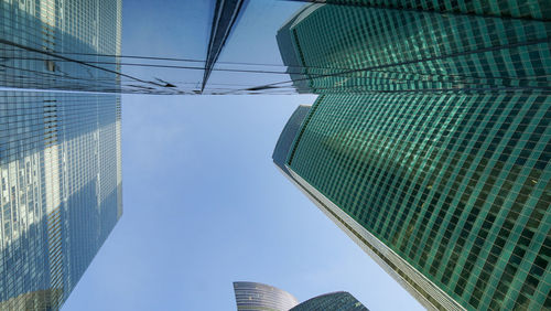 Low angle view of skyscrapers against sky