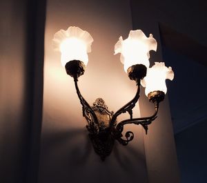 Low angle view of illuminated light bulb