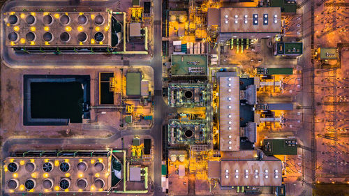 Aerial view of illuminated factory