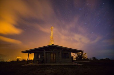 Low angle view of building against sky at night