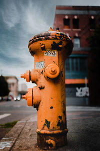 Close-up of fire hydrant against sky