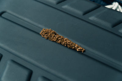 High angle view of cigarette on table