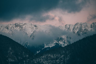 Scenic view of mountains against sky during winter