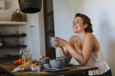 Smiling woman looking away