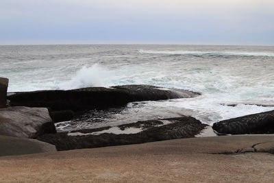 Scenic view of sea against clear sky