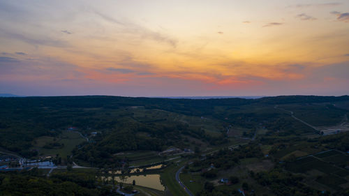 High angle view of townscape against sky during sunset